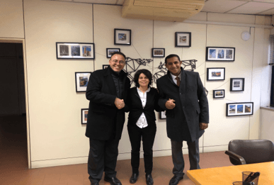 Crew preparing maintenance equipment on rooftop