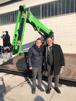 Monorail track install along building edge